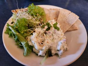 Pita triangles with raita and greens